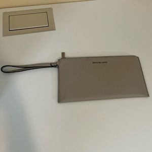 Michael Kors clutch brand new with tags beige clutch wallet purse with strap